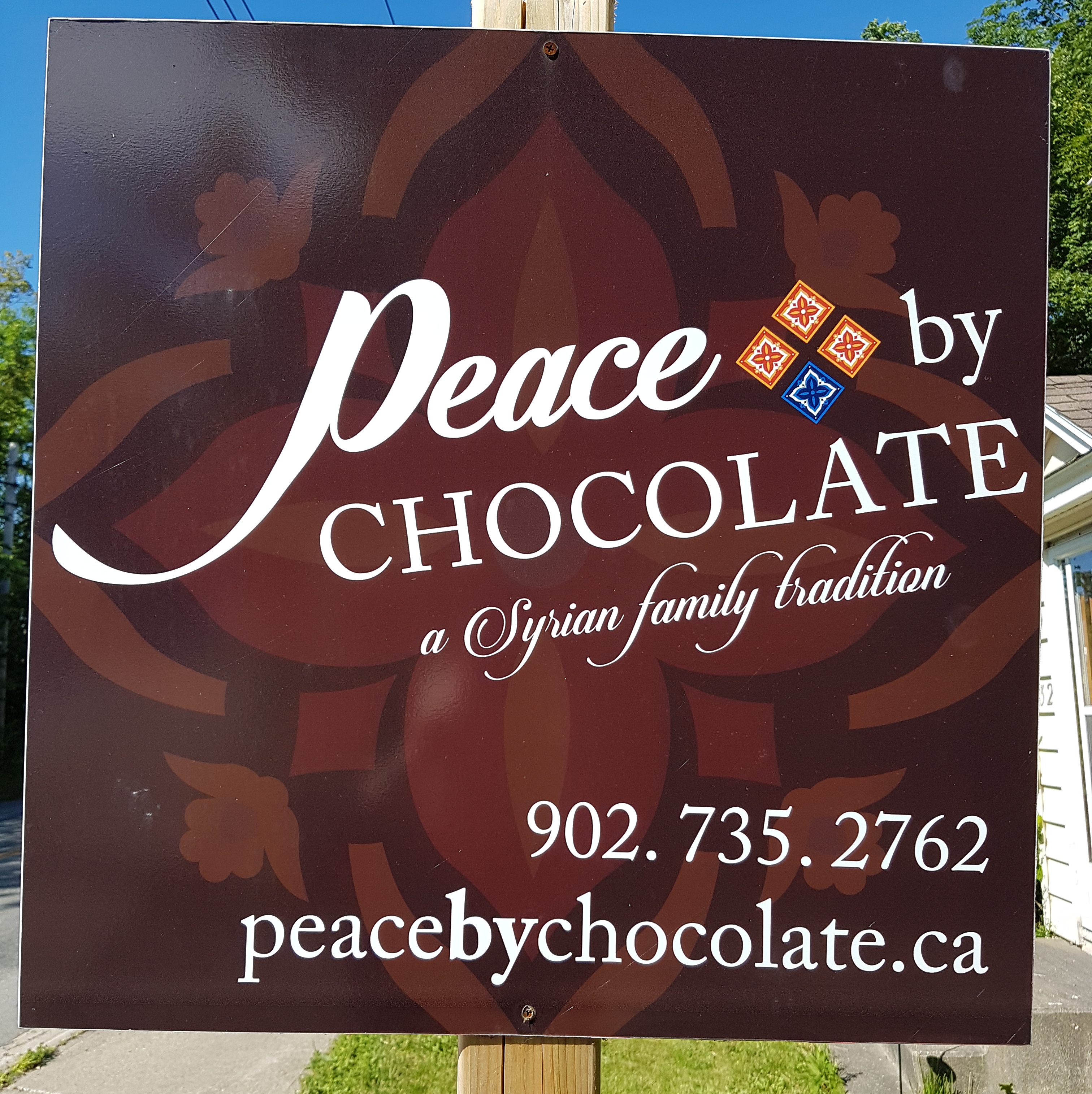 peace by chocolate sign